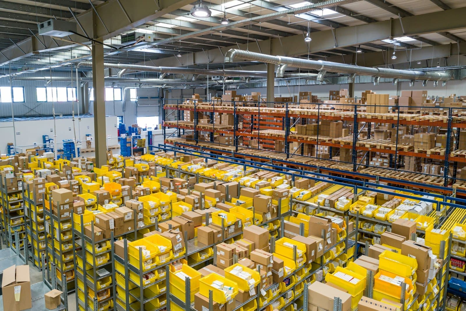 Unit 4's clear-span warehouse floor, racked to eaves height