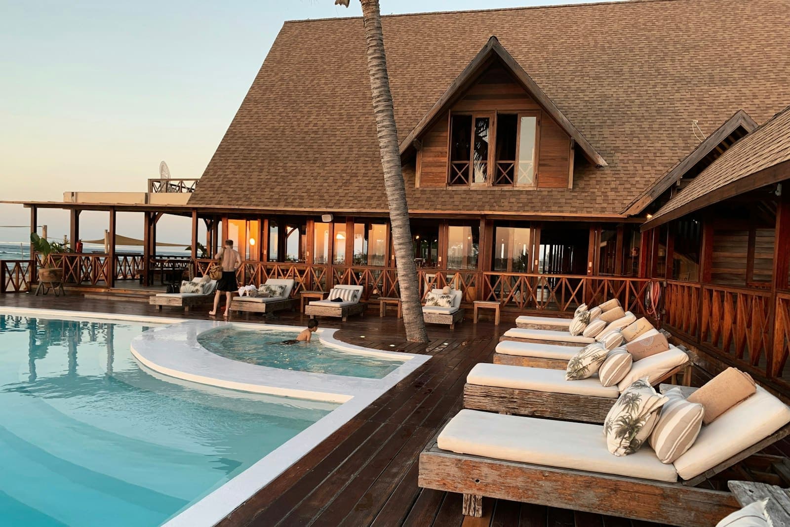 Zambezi Reach: the central thatched pavilion and pool deck above the river bank